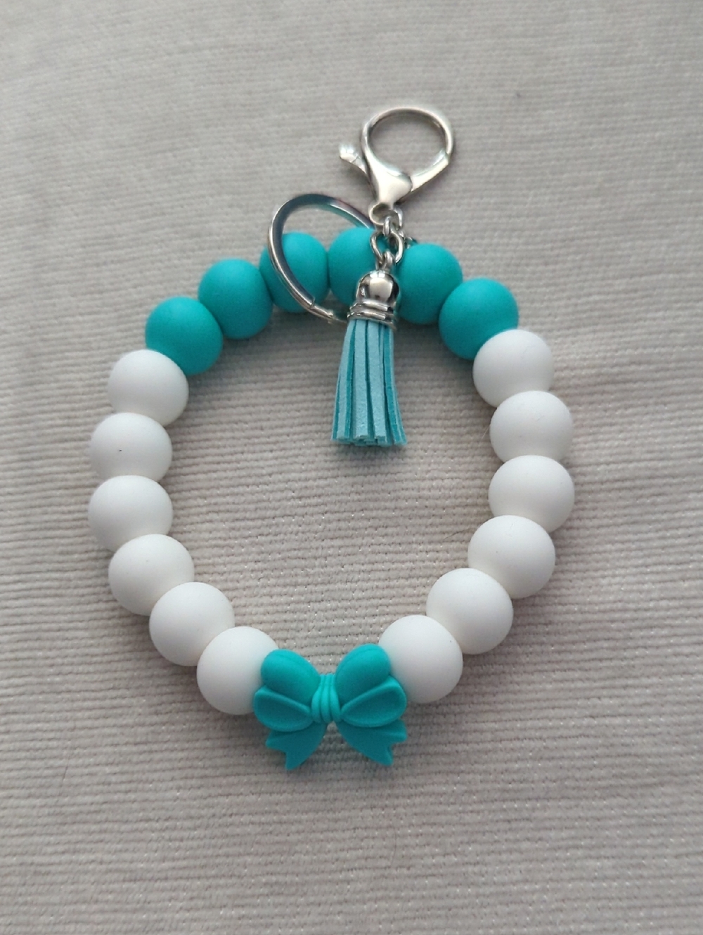 White and Turquoise Beaded Keychain Bracelet with Tassel & Bow